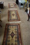 Set of three small floor rugs, 120cm long