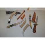 Mixed Lot: Small Kukri in leather sheath together with two further Middle Eastern knives in white