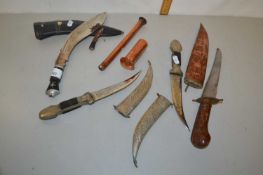 Mixed Lot: Small Kukri in leather sheath together with two further Middle Eastern knives in white