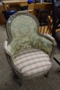 A French 19th Century armchair, the frame with carved decoration and set on fluted legs, requiring