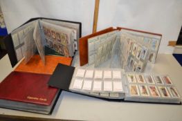 Five albums of various cigarette cards