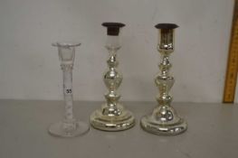 Glass candlestick with opaque twist stem, together with two further glass candlesticks, silver