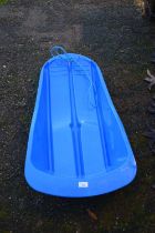 Blue plastic sledge