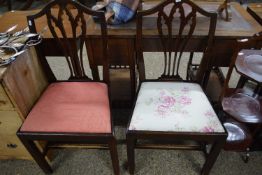 A pair of 19th Century dining chairs with pierced backs