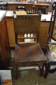 Late 19th Century side chair with pressed leather seat and back