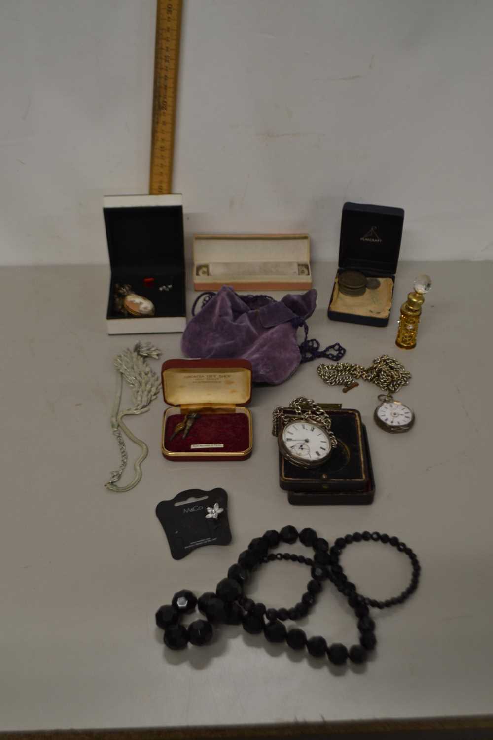 A tray of mixed items to include two silver cased pocket watches, various costume jewellery, scent