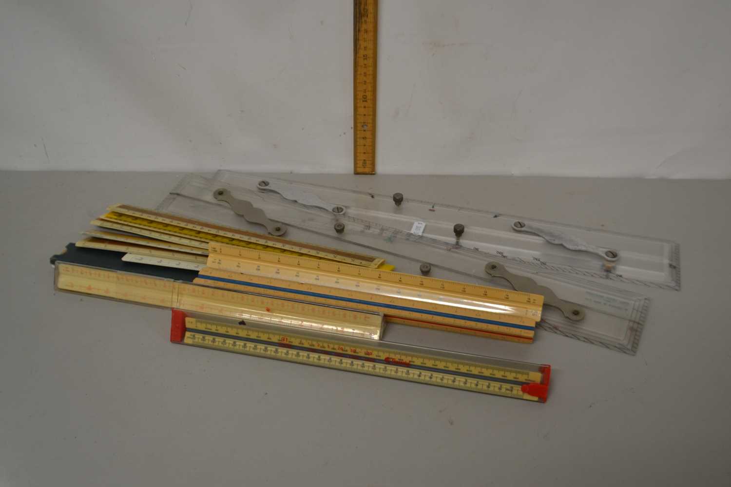 Box of various vintage rulers