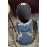 A painted metal coal chute