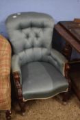 Victorian mahogany framed and button upholstered armchair