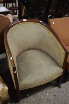 An Edwardian bow back armchair