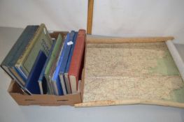 Box of various books, aircraft interest together with a vintage linen backed map of London and the