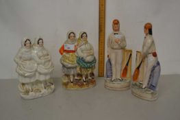 Two pairs of Staffordshire figures (4)