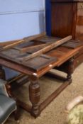 Early 20th Century oak drawer leaf dining table on turned legs, 137cm long
