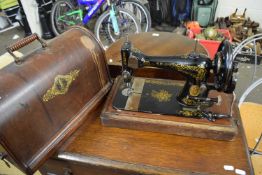 Singer sewing machine, cased