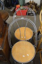 A pair of aluminium framed kitchen chairs