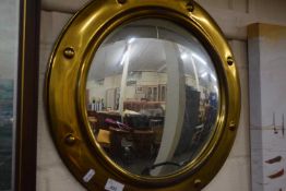 Convex brass framed wall mirror