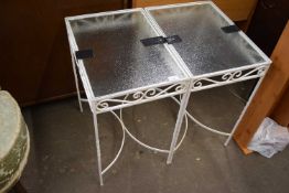 Two white painted metal framed glass top side tables