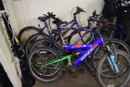 Four assorted bicycles
