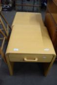 A pair of single drawer bedside/side tables