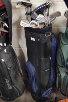Golf caddy and a quantity of clubs