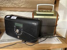 A Pure One Elite radio and a Roberts Romano radio