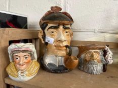 A Sherlock Holmes style tobacco jar together with a character jug The Tramp and another of a lady (