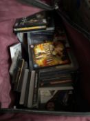 A large holdall and a quantity of assorted DVD's