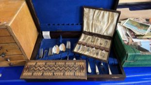 A canteen and quantity of matched cutlery, cake forks and a cribbage board