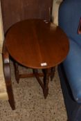 Oval topped mahogany occasional table