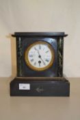 A Victorian black slate and marble mounted mantel clock