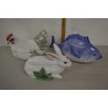 A group of three modern porcelain tureens formed as a rabbit, a chicken and a fish