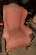 Early 20th Century wing backed armchair, for re-upholstery