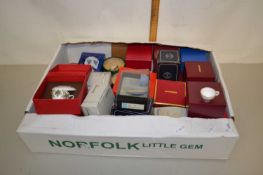 A collection of boxed miniature cups and saucers to include examples by Royal Worcester, Caverswall,