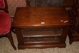 An Old Charm oak television cabinet