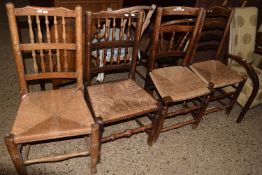 A group of four various rush and sisal seated kitchen chairs