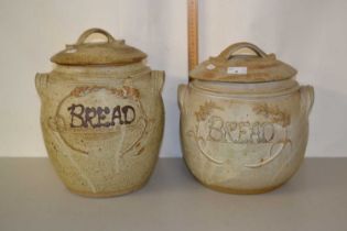 Two pottery bread bins
