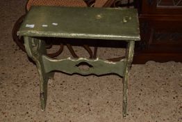 A green painted stool