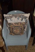 Blue painted Lloyd Loom chair