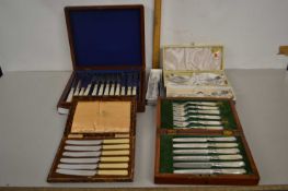 Mixed Lot: Two cases of mother of pearl handled cutlery plus various silver plated serving spoons