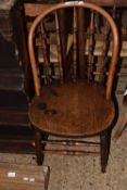 An elm seated kitchen chair