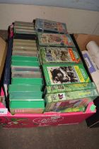A collection of Anglia Television interest VHS tapes and a hardbound book, to include: - Junior