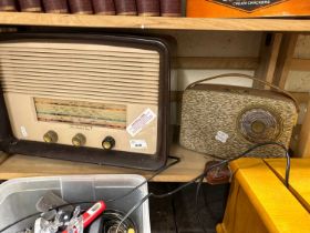 An HMV radio and another portable radio
