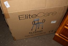 A perching stool, as new, boxed together with a mattress protector