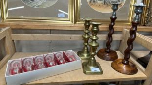 Pair of brass candlesticks, a pair of wooden candlesticks and a cased set of sherry glasses