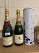 Three assorted bottles of champagne
