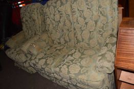 A two seater sofa and matching armchair