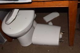 White ceramic toilet and cistern