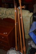A quantity of curtain rods, finials and hooks