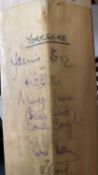A cricket bat from the Brian Close CBE Charity Dinner, Leeds 1996, bearing the signatures yet of the