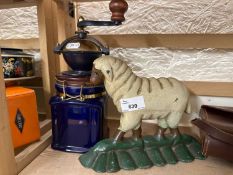 A cast iron sheep doorstop and a coffee grinder